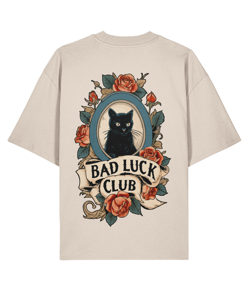 Cream oversized back print t-shirt with a black cat and floral tattoo design.