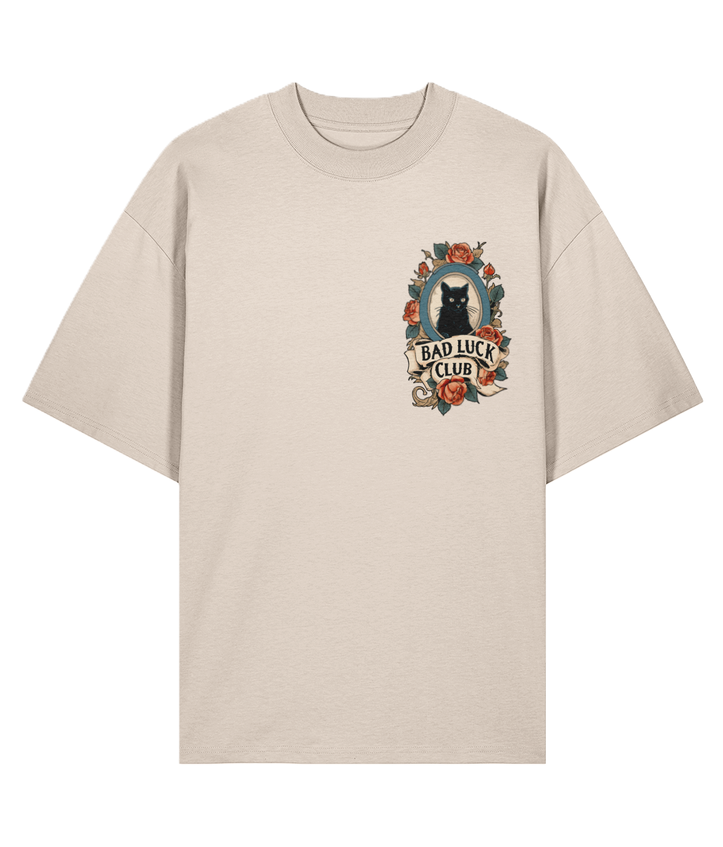 Cream Oversized Tattoo t-shirt with a black cat and floral design.