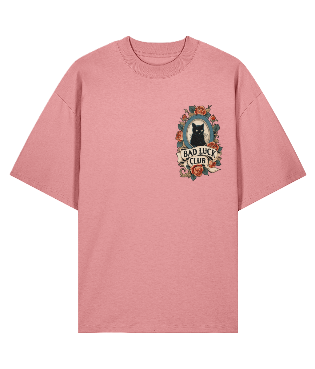 Pink oversized graphic t-shirt with a black cat tattoo graphic and 'Bad Luck Club' text.