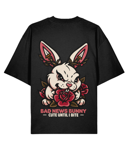 Black t-shirt with a graphic of a bunny holding a rose and text 'Bad News Bunny Cute Until I Bite' on a white background.