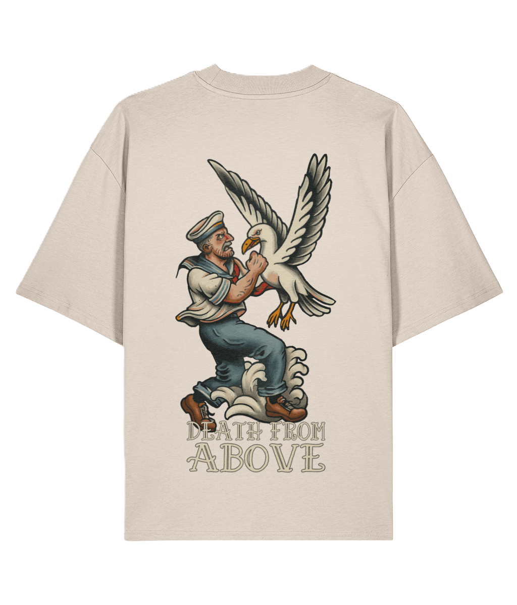 Beige t-shirt with a graphic design of a sailor and seagull on the back, text 'Death from Above' below.