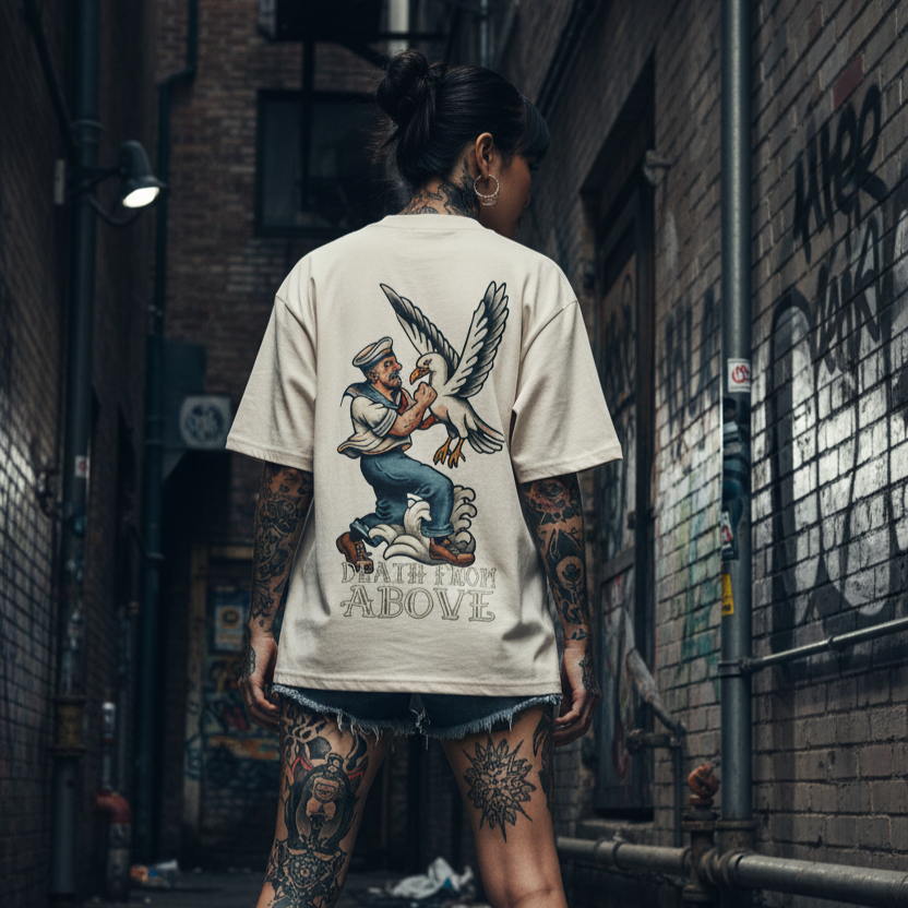 Woman wearing a t-shirt with a graphic design in an urban alleyway.