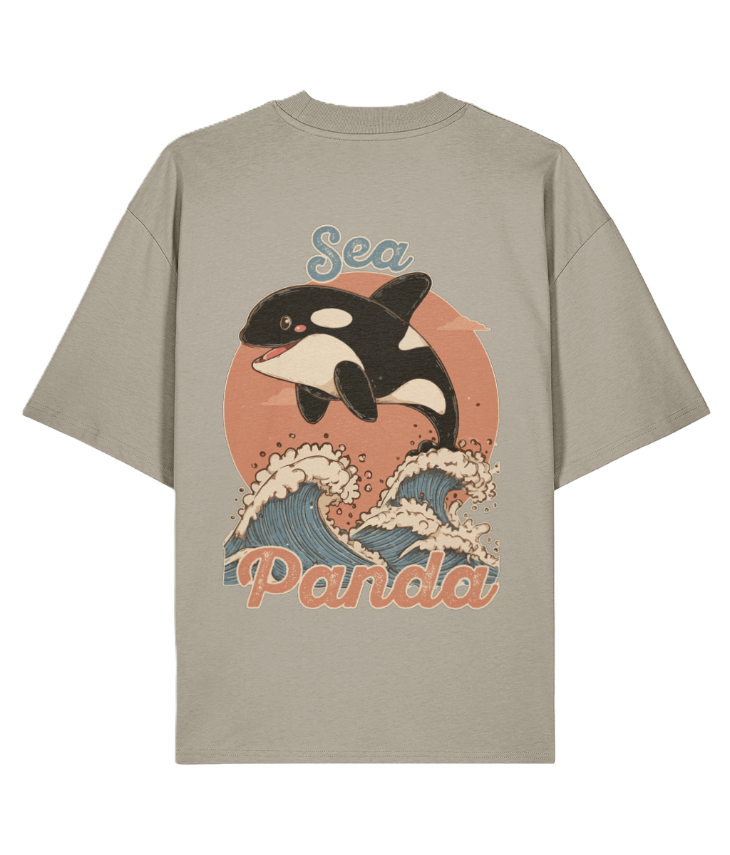An oversized backprint graphic T-shirt with an orca whale graphic and 'Sea Panda' text on a beige background